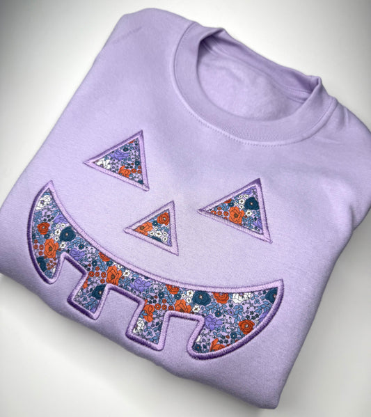 Pastel Floral Pumpkin Face Sweatshirt
