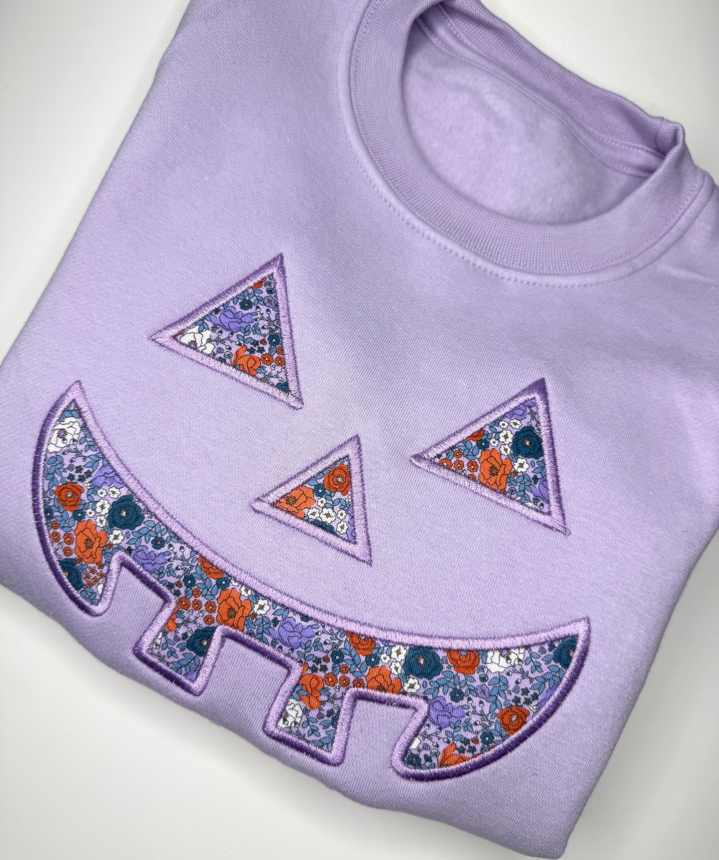 Pastel Floral Pumpkin Face Sweatshirt